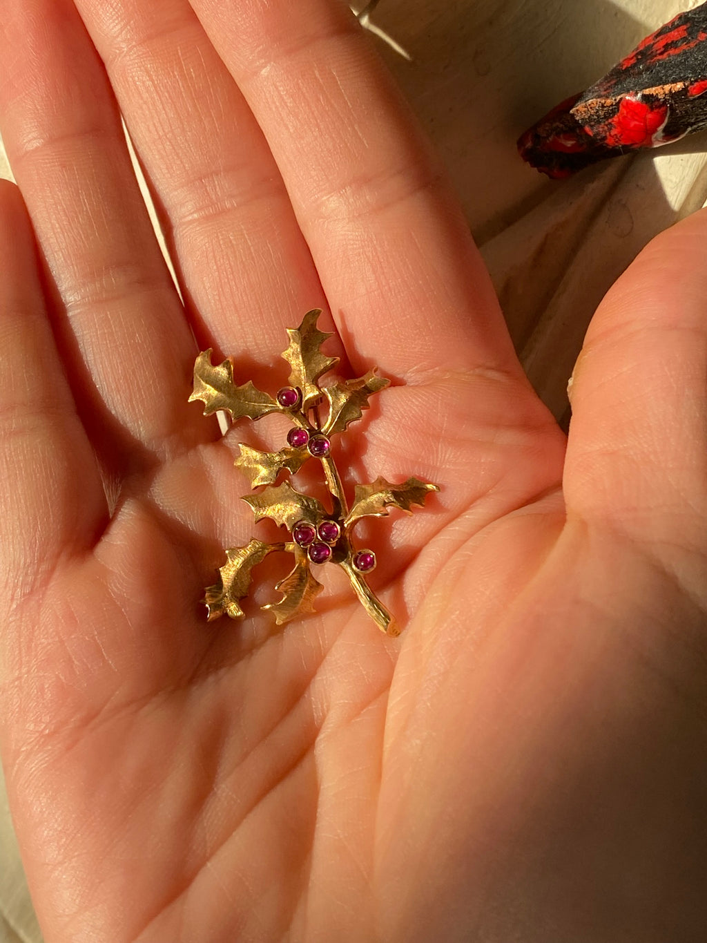 Ruby Holly Brooch | 0.20ct Ruby Cabochon in 18ct Yellow Gold