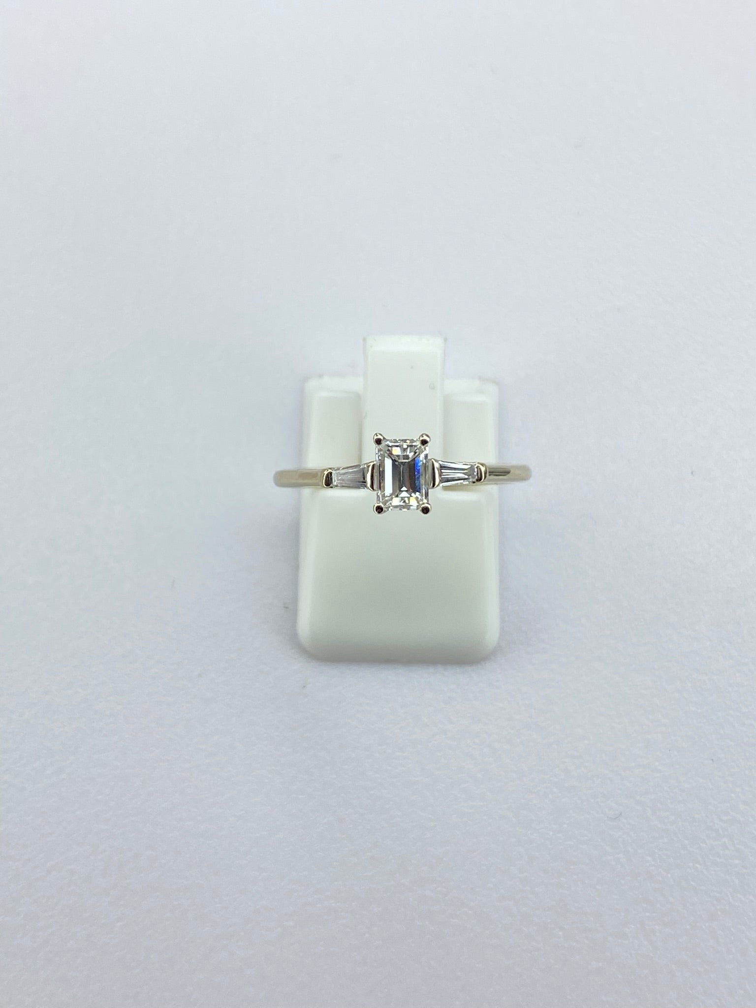 0.45ct Emerald Cut Diamond Three Stone Ring – 18KT Gold