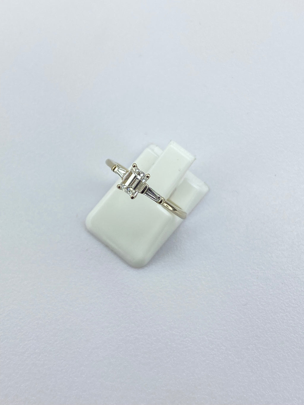 0.45ct Emerald Cut Diamond Three Stone Ring – 18KT Gold