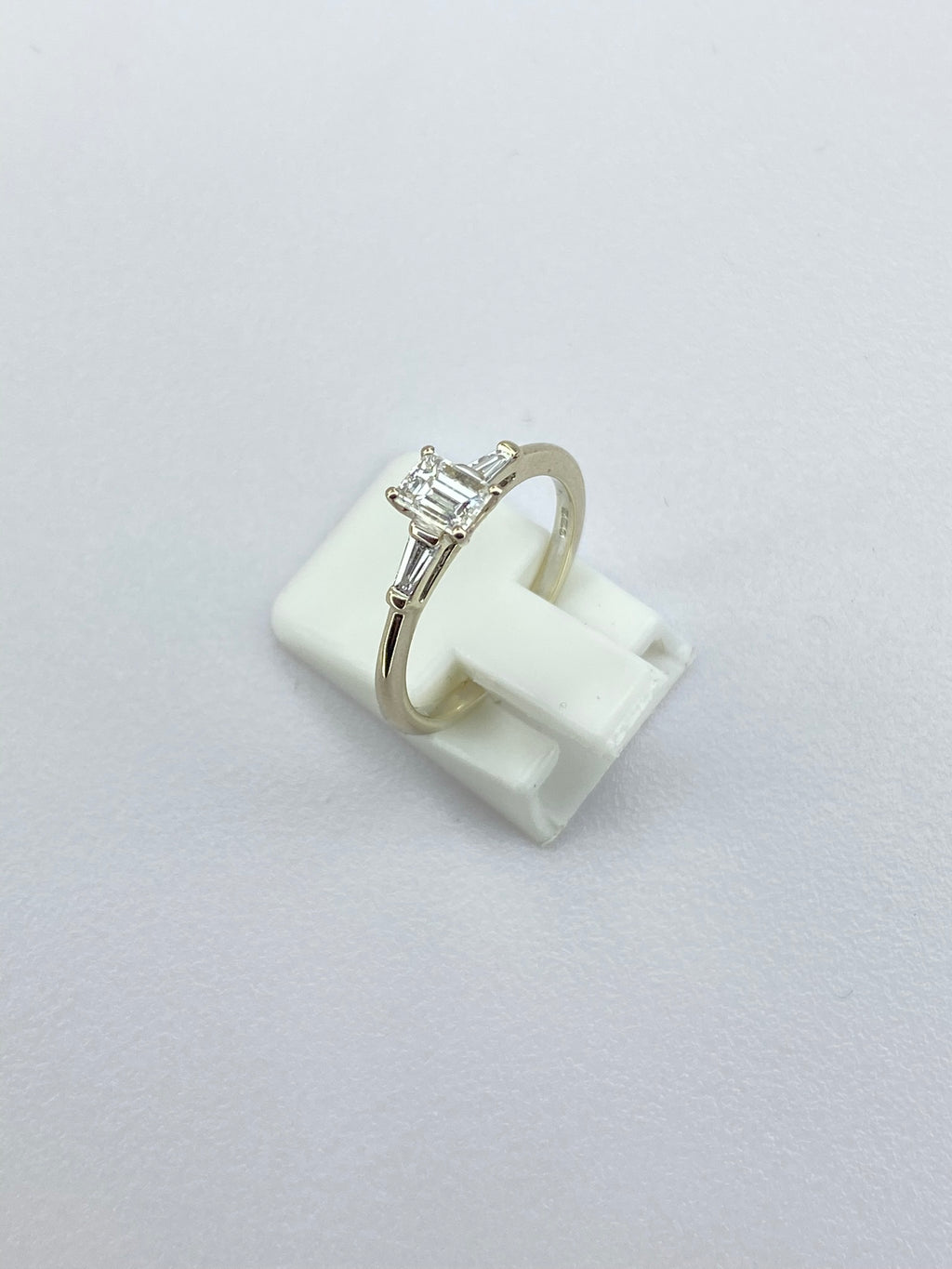 0.45ct Emerald Cut Diamond Three Stone Ring – 18KT Gold