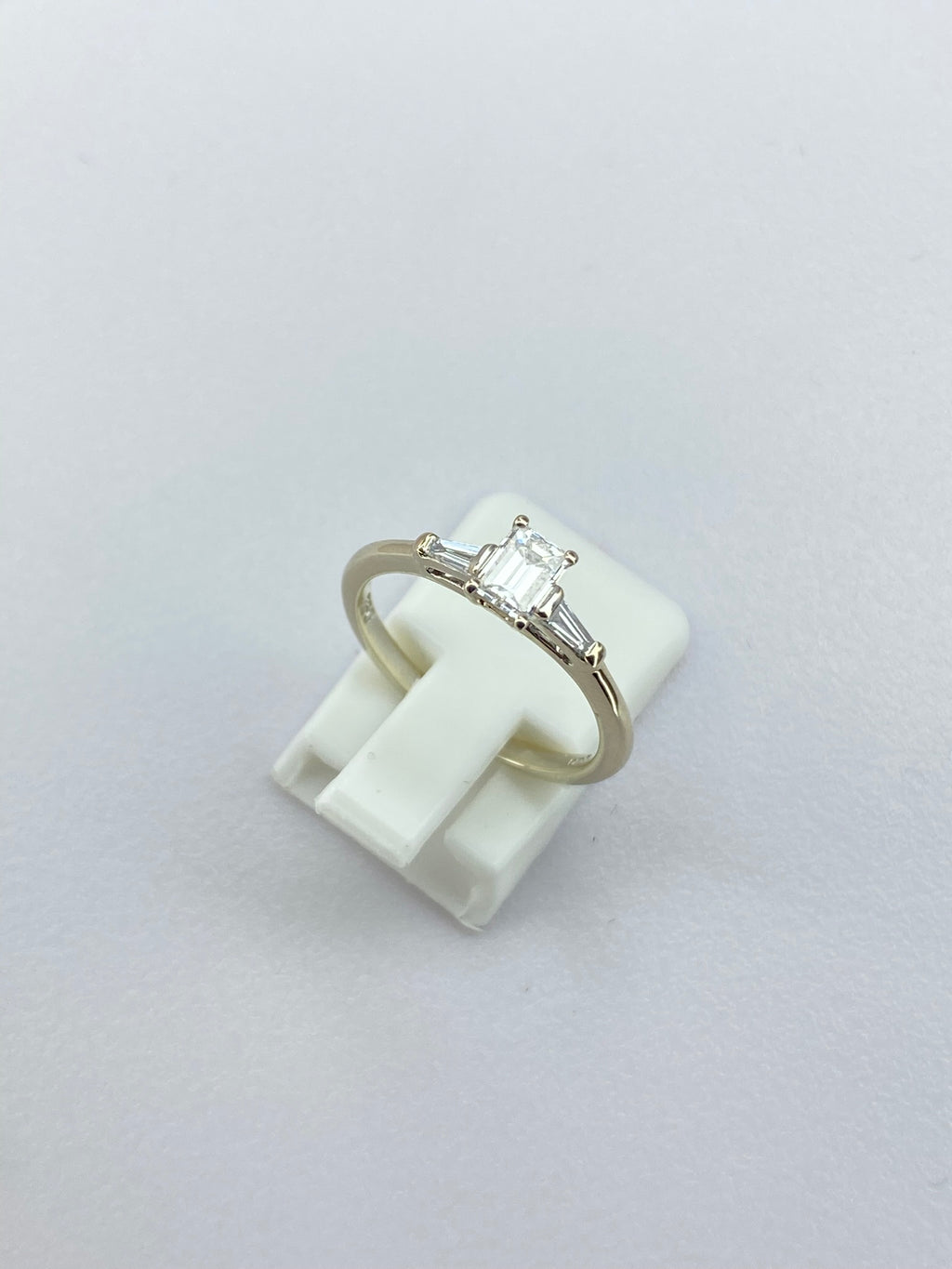 0.45ct Emerald Cut Diamond Three Stone Ring – 18KT Gold