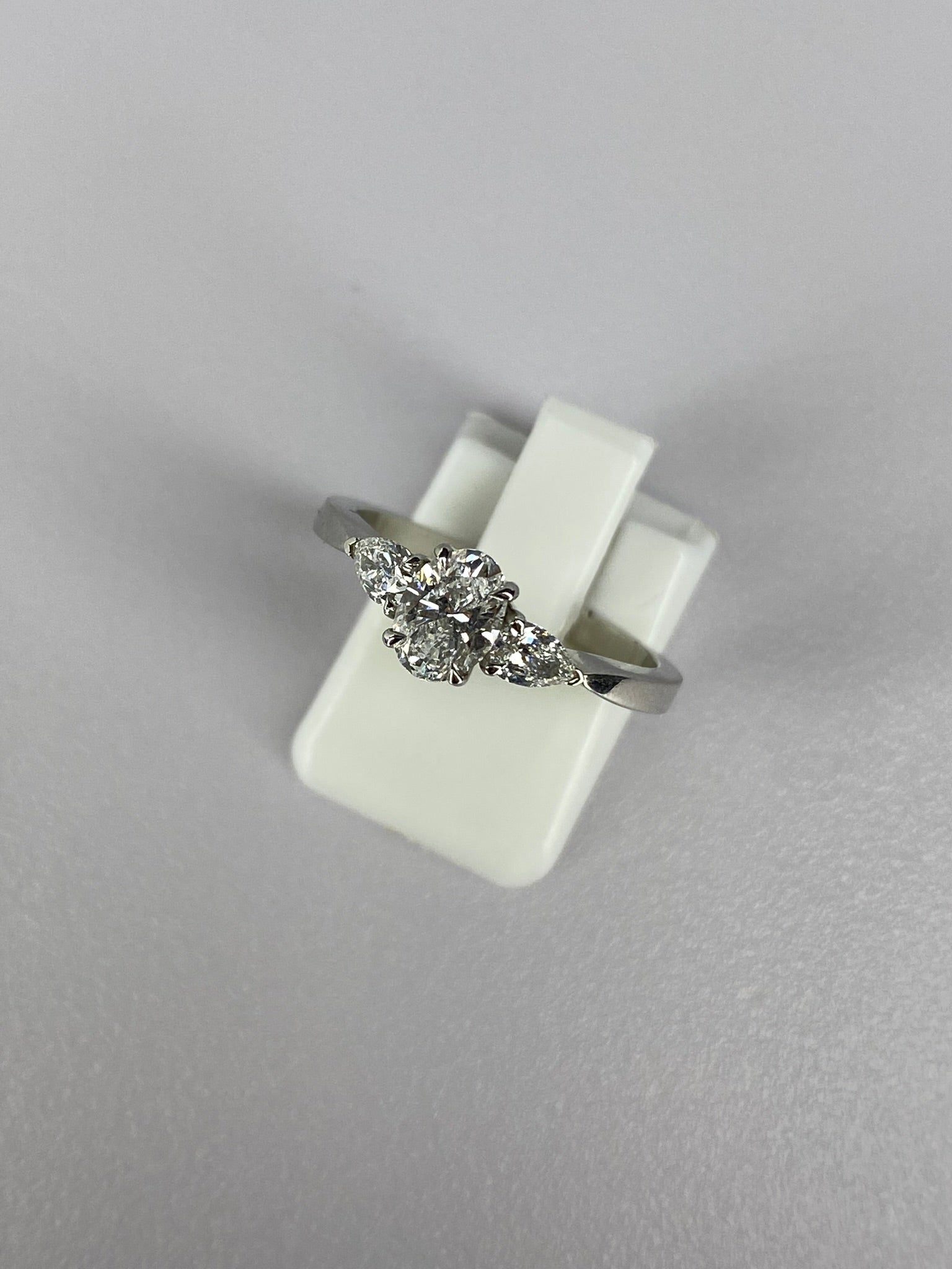 Oval Diamond & Pear Trilogy Ring in Platinum – 0.95ct Total Diamond Weight