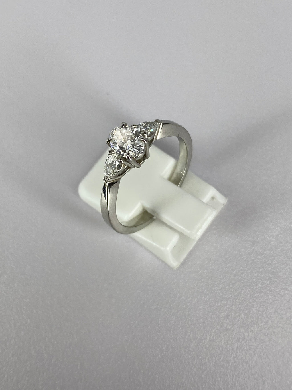 Oval Diamond & Pear Trilogy Ring in Platinum – 0.95ct Total Diamond Weight