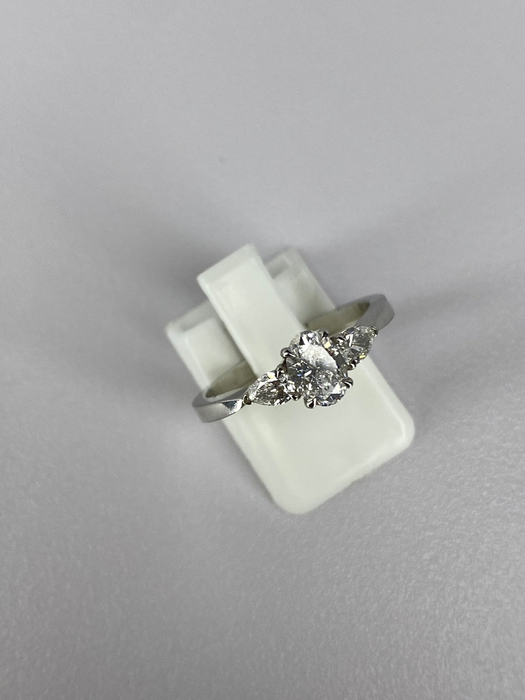 Oval Diamond & Pear Trilogy Ring in Platinum – 0.95ct Total Diamond Weight