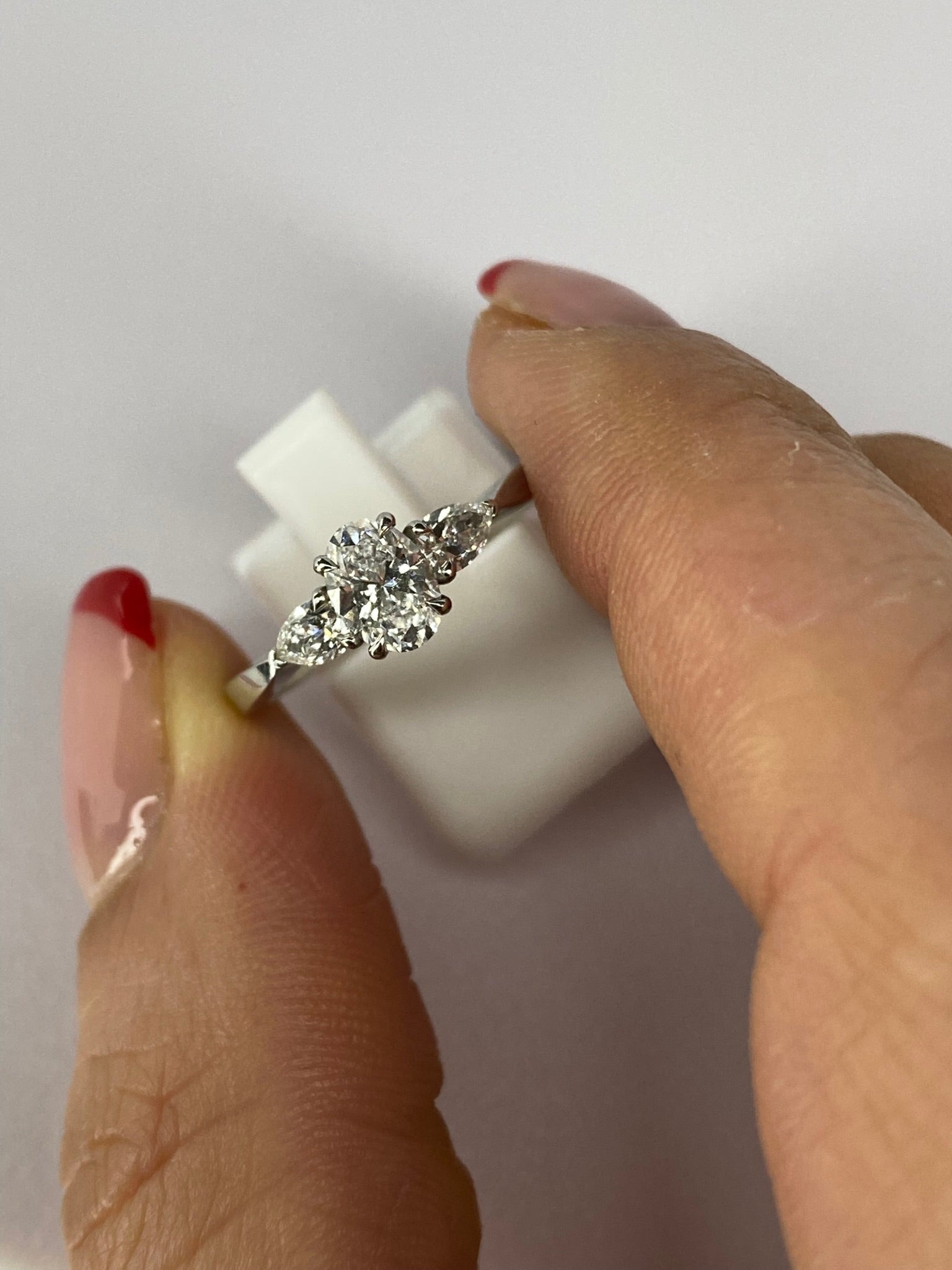 Oval Diamond & Pear Trilogy Ring in Platinum – 0.95ct Total Diamond Weight