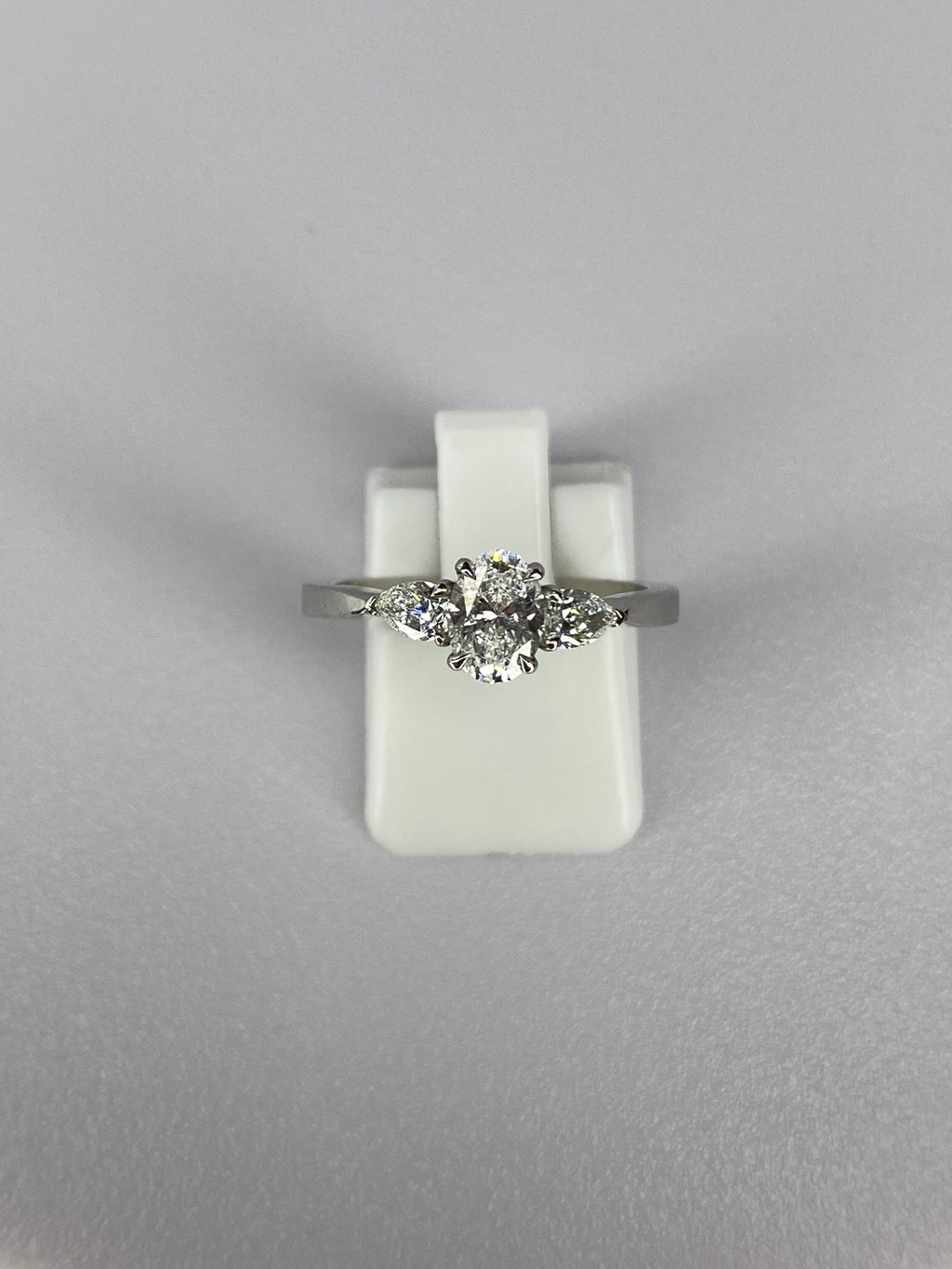Oval Diamond & Pear Trilogy Ring in Platinum – 0.95ct Total Diamond Weight