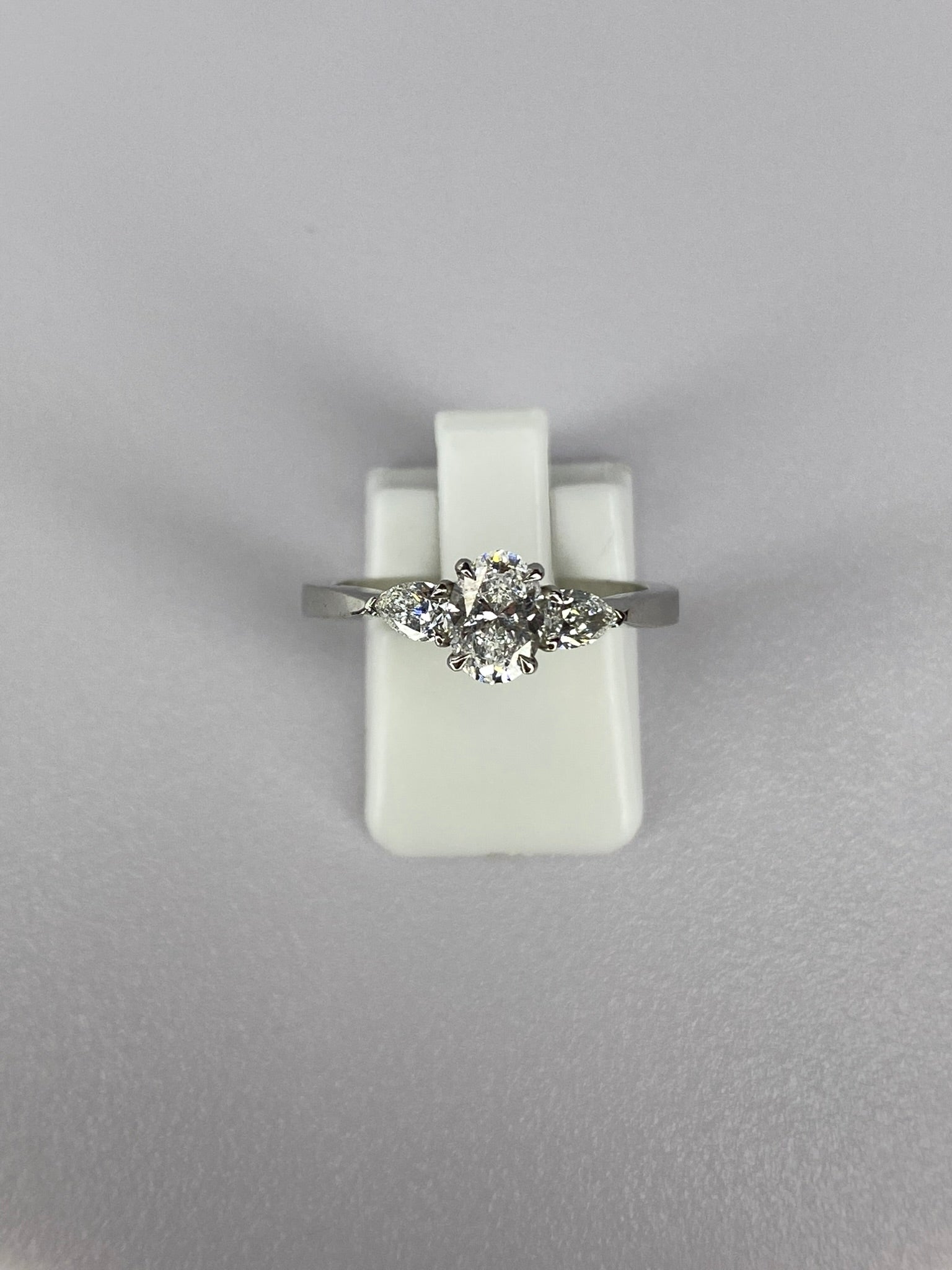 Oval Diamond & Pear Trilogy Ring in Platinum – 0.95ct Total Diamond Weight